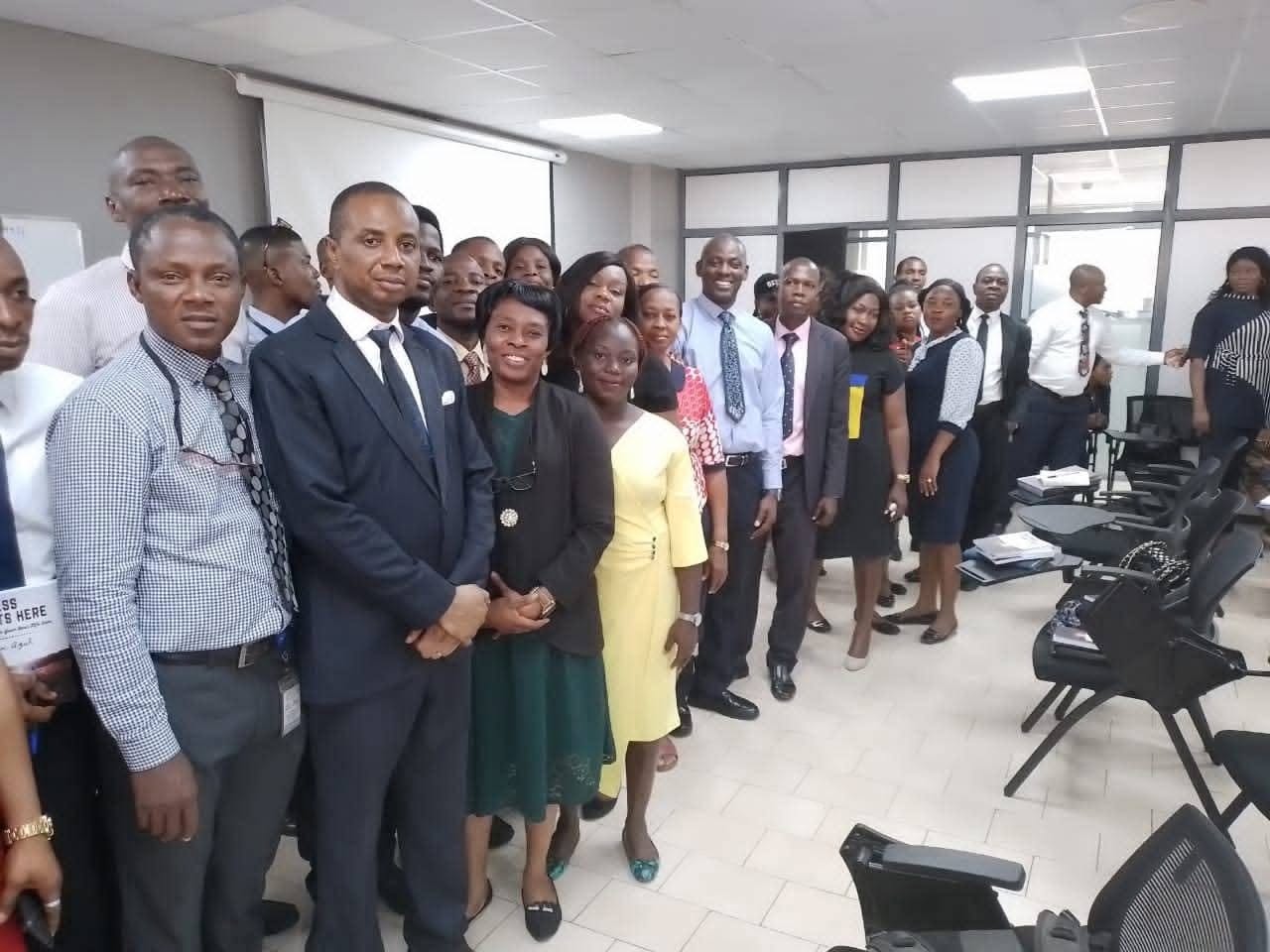 Chinedum Azuh with a group of attendees at a gathering